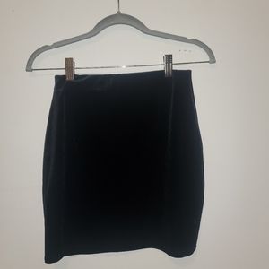 Black velvet mini skirt
